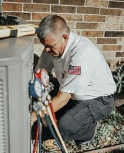 Milestone technician performing ac repair