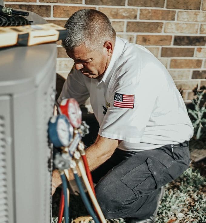 Milestone technician performing ac repair