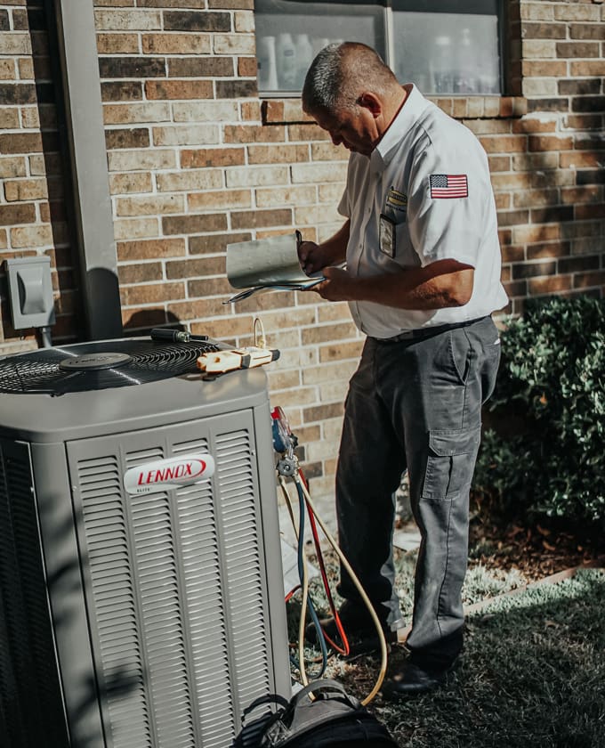 Milestone technician performing an HVAC inspection
