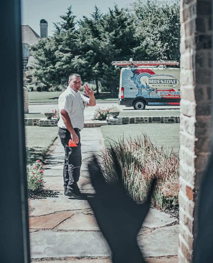 Milestone technician leaving customers house